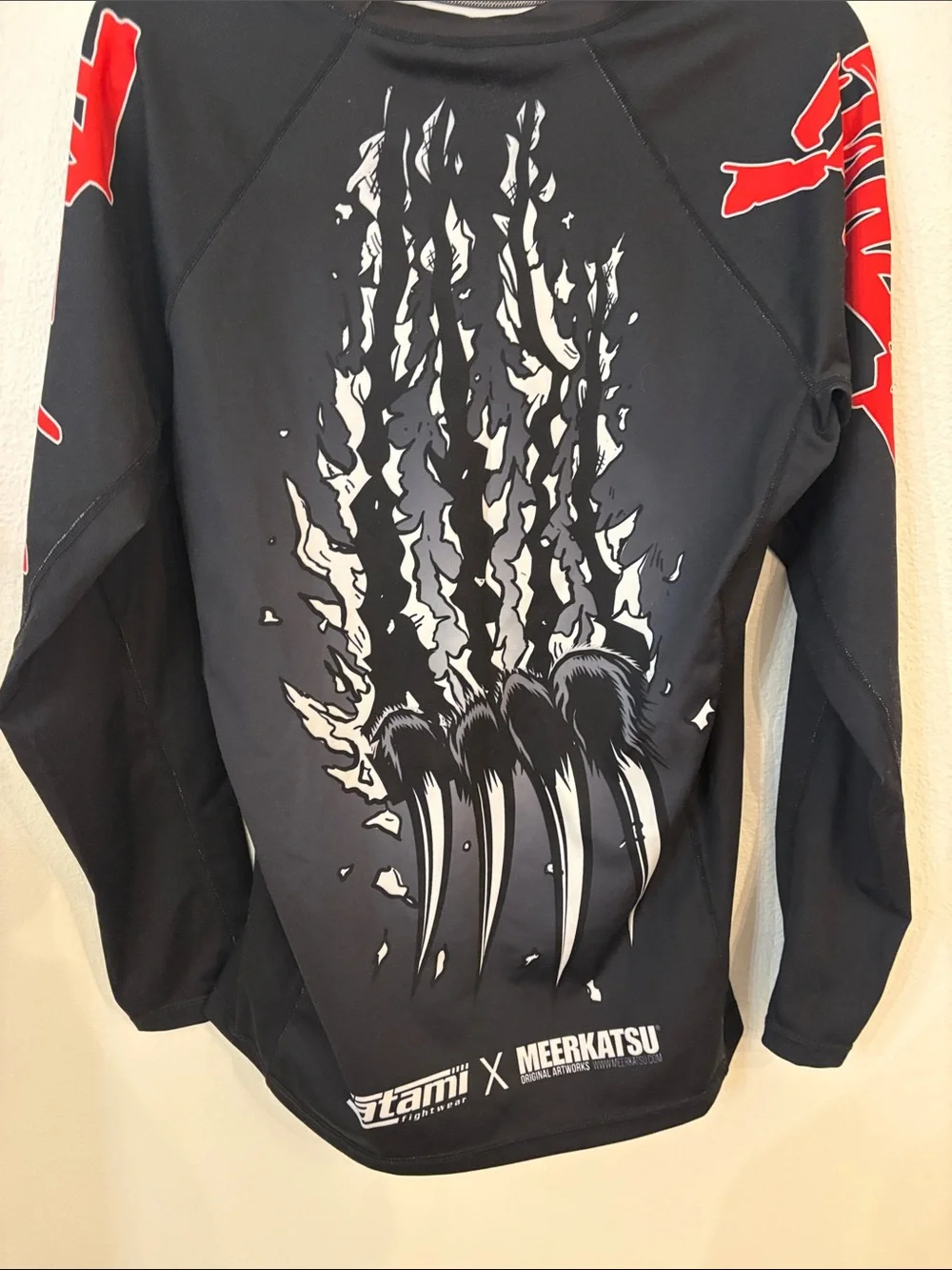 Tatami Fightware x Meerkatsu Original artwork black rash guard w/ animal graphic